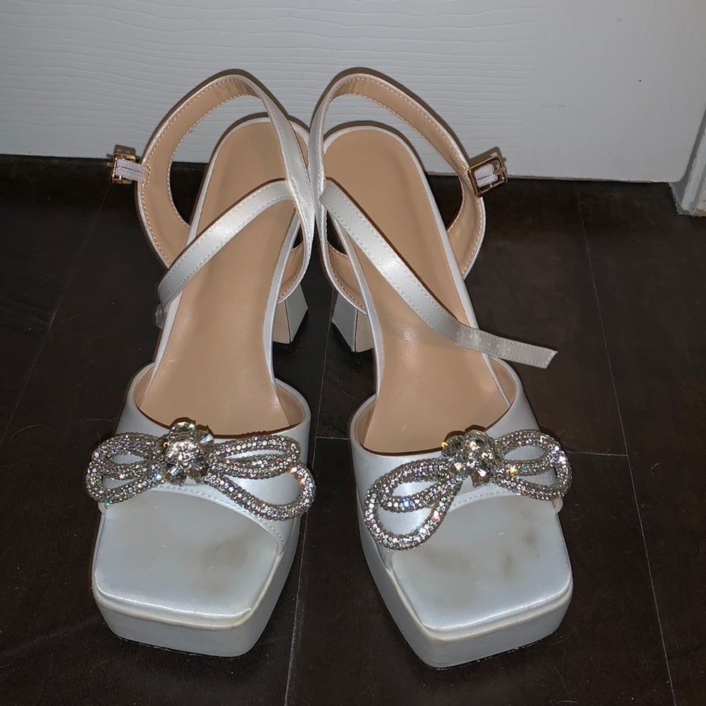 White satin heels with crystal bow
